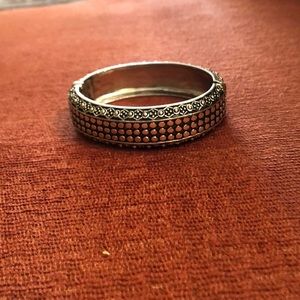 Silver tone bracelet with magnetic lock